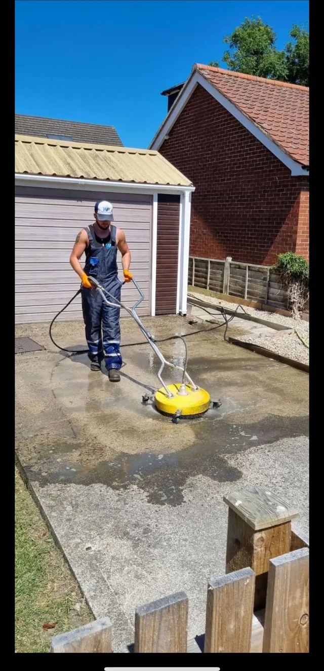 Pressure washing a paved patio with a surface cleaner